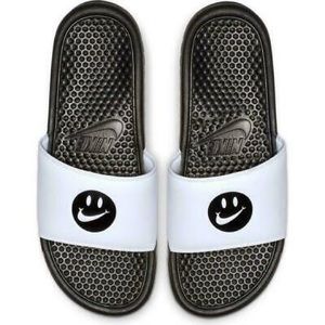 nike slides with smiley face